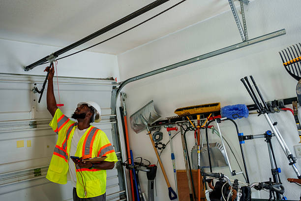 Professional Garage Door Panel Replacement technician working in West Falmouth, MA